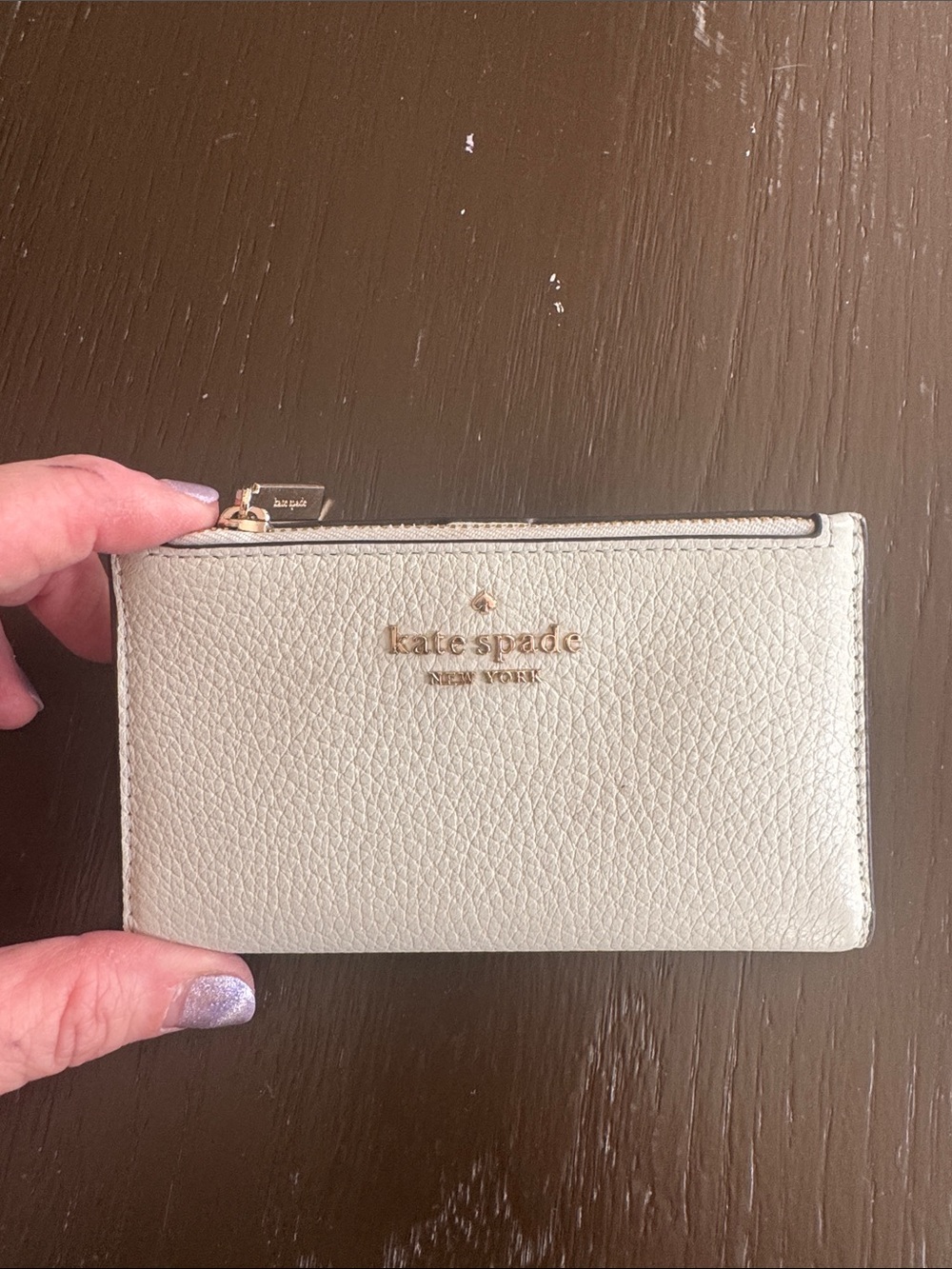 kate spade light blue pebbled leather zip card case with gold logo